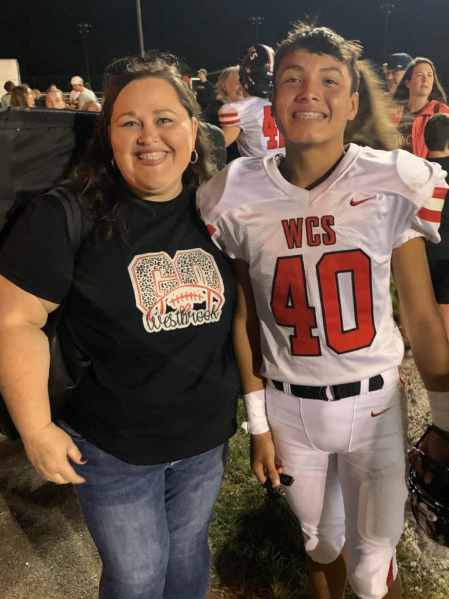 Victor after his first football game with his #1 fan, Mom Snider