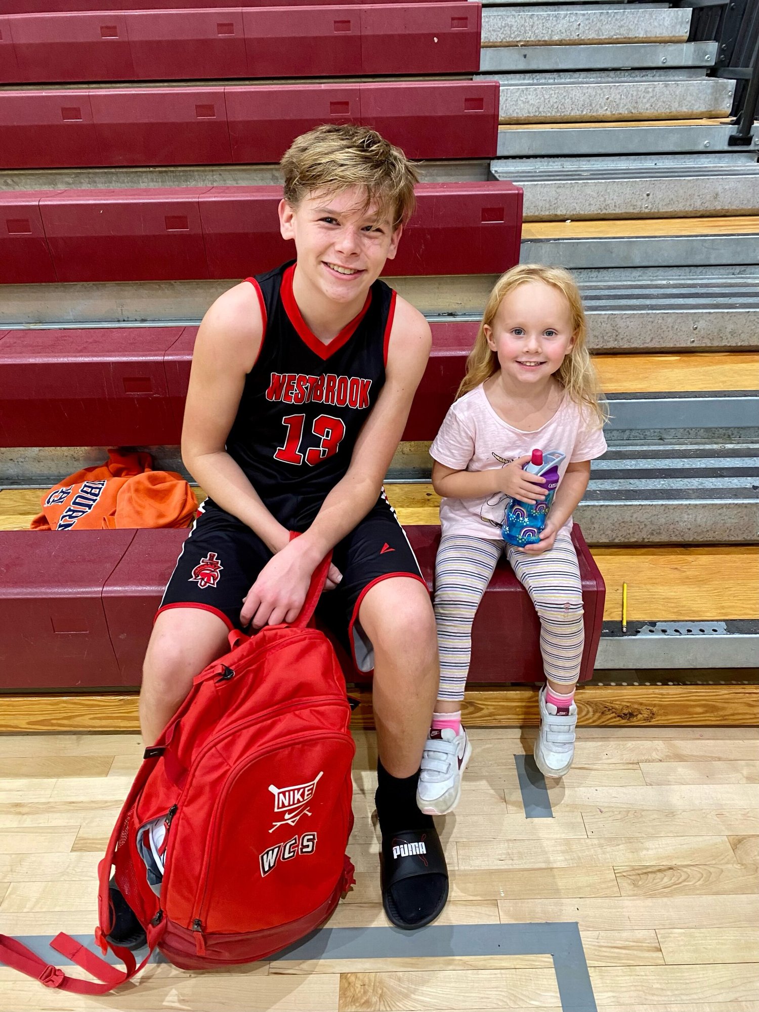Mason with his sister Ava after a WCS basketball game