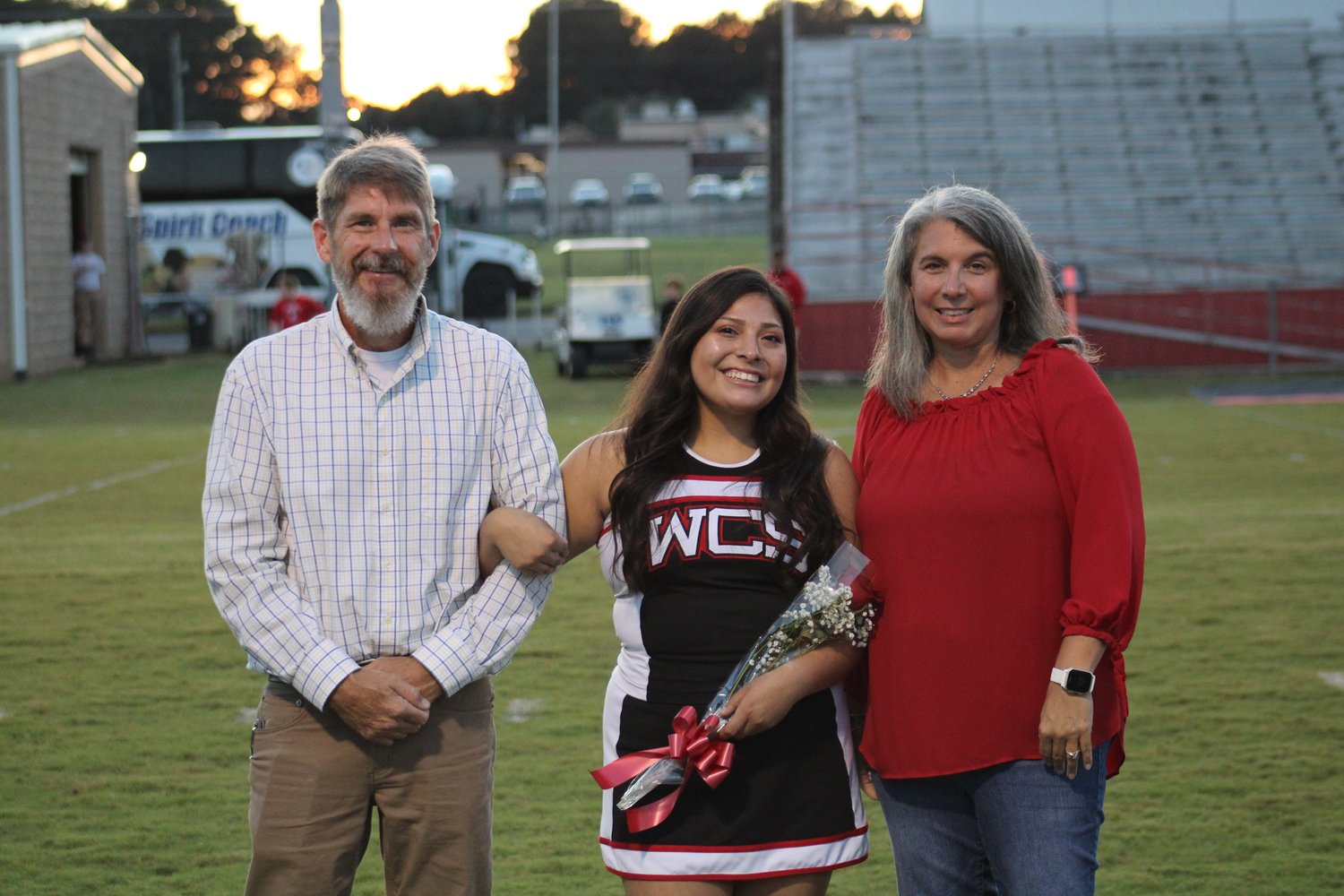 Diana with houseparents Mike and Suzanne on Senior Night 