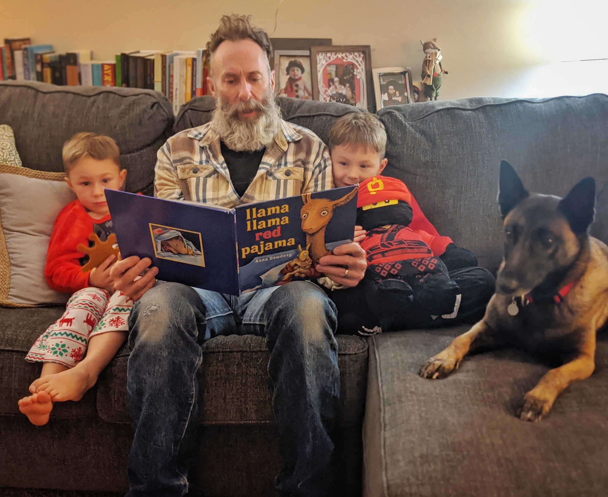 Grey Reading to grandsons